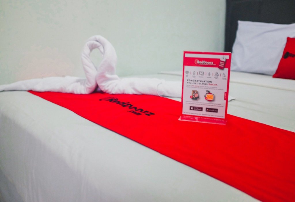 Фото Oyo 283 Helvetia Residence