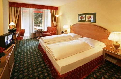 Фото Alpine City Wellness Hotel Dominik