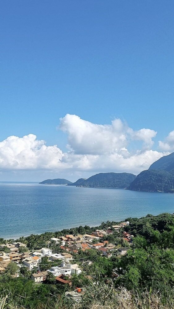 Фото Magnífica Mansão à 50m da praia de Barequeçaba para até 18 pessoas