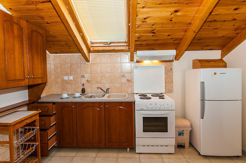 Фото Kavos Psarou Studios and Apartments