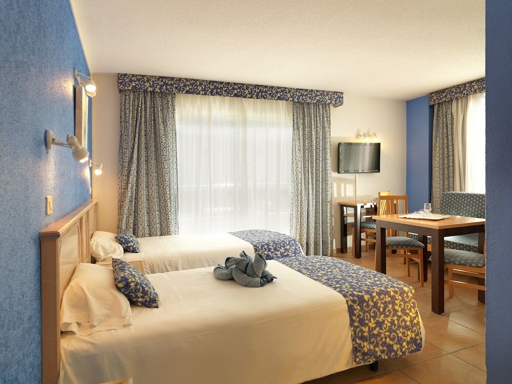 Фото Apartamentos Oro Blanco