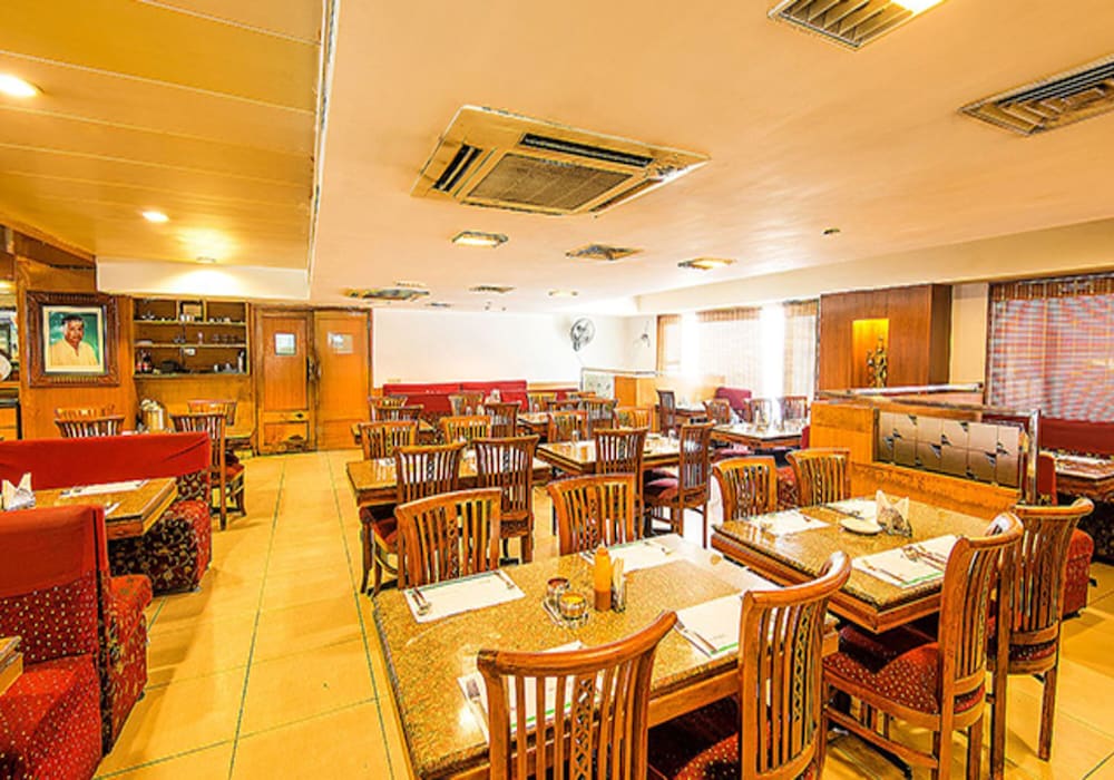 Фото Fabhotel Blossoms Service Apartment