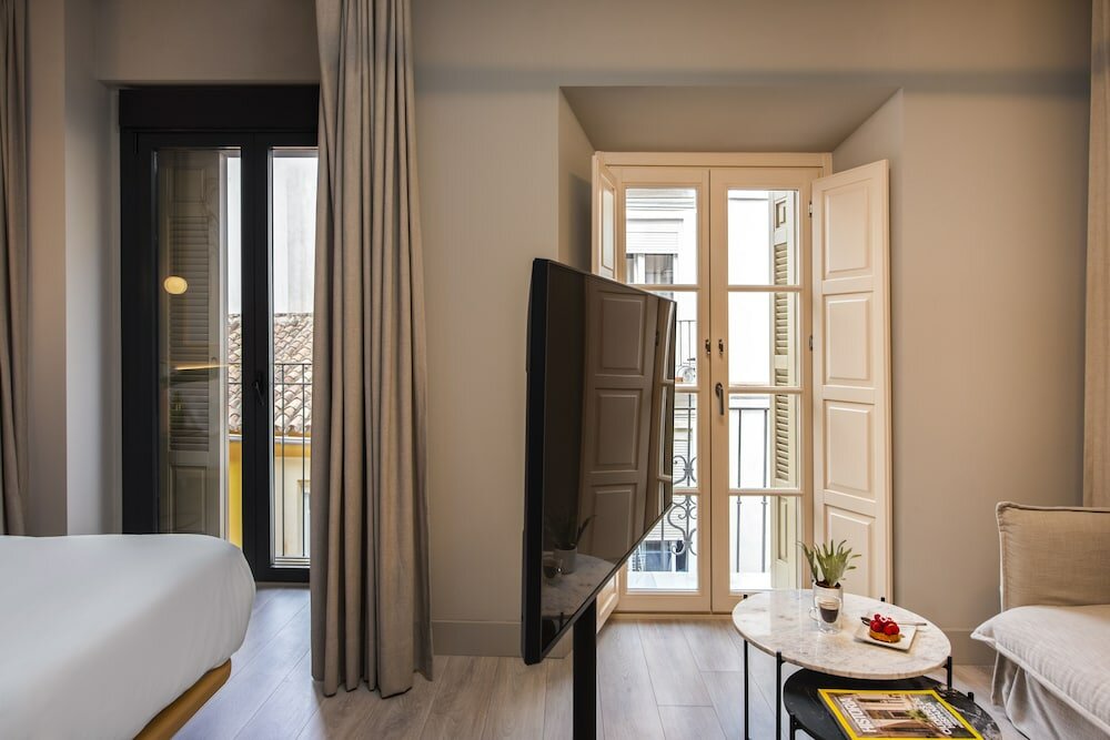 Фото Coeo Peña Design Apartments