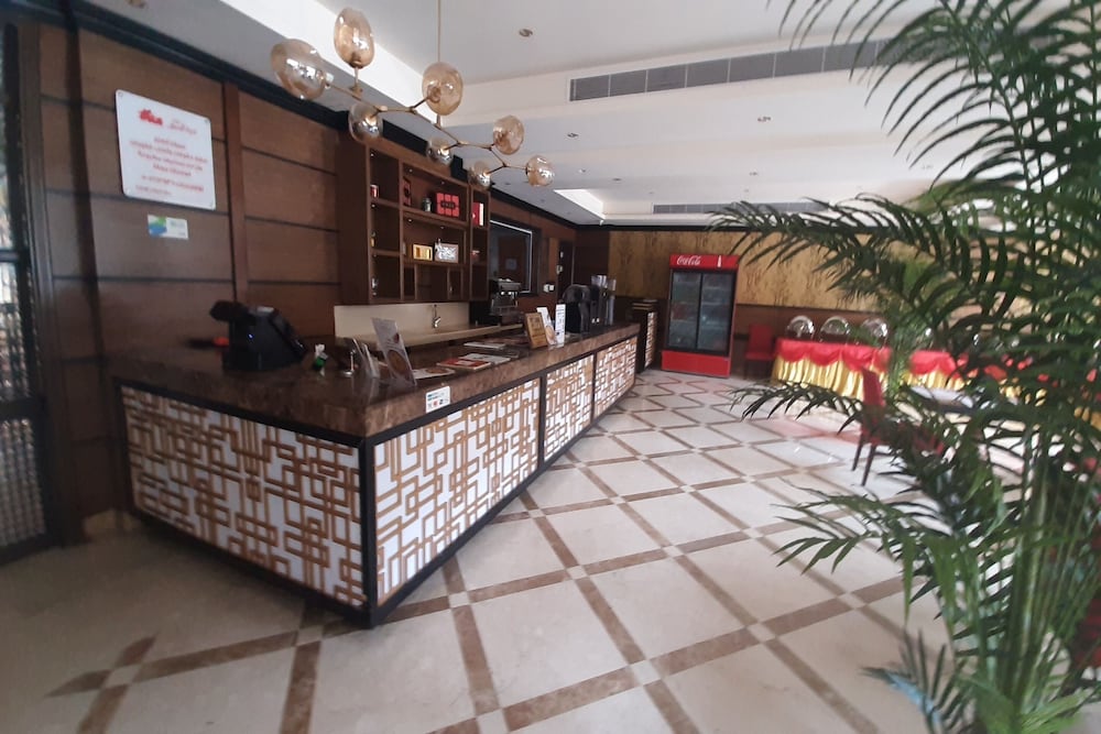 Фото The Blue Rose Hotel - الورده الزرقاء للوحدات السكنيه