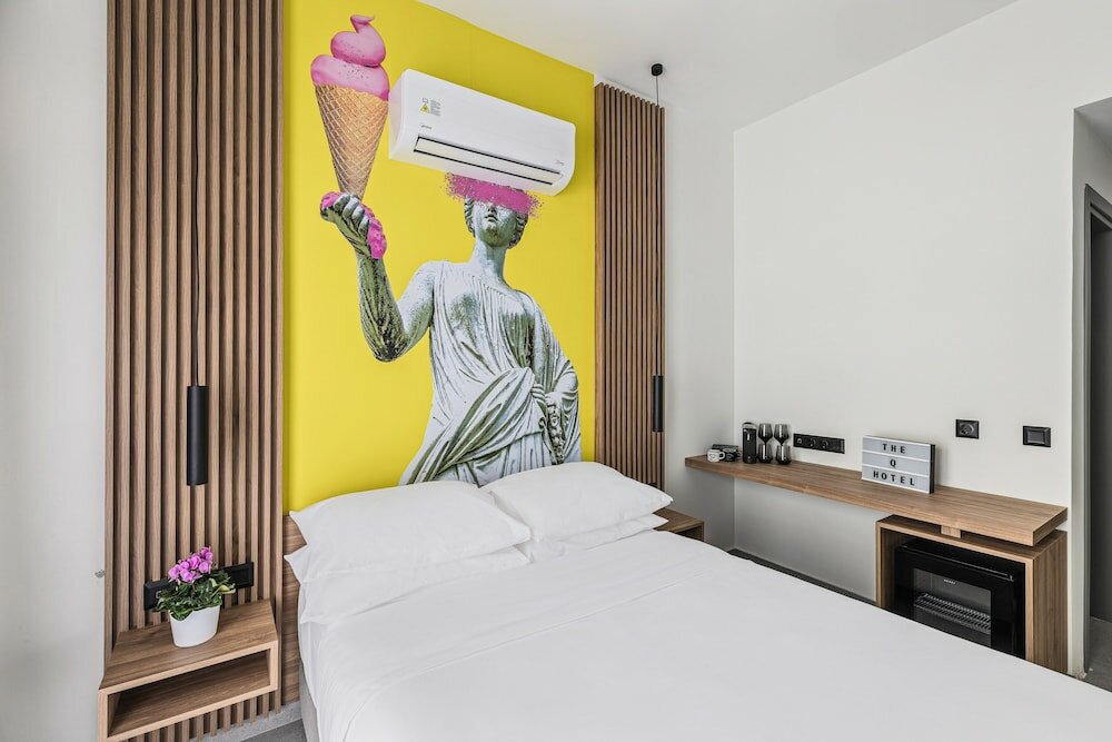 Фото The Q Hotel