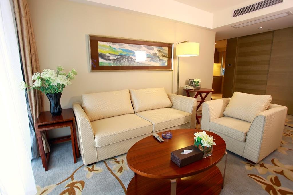 Фото Shenzhen New World Metro Grand Hotel