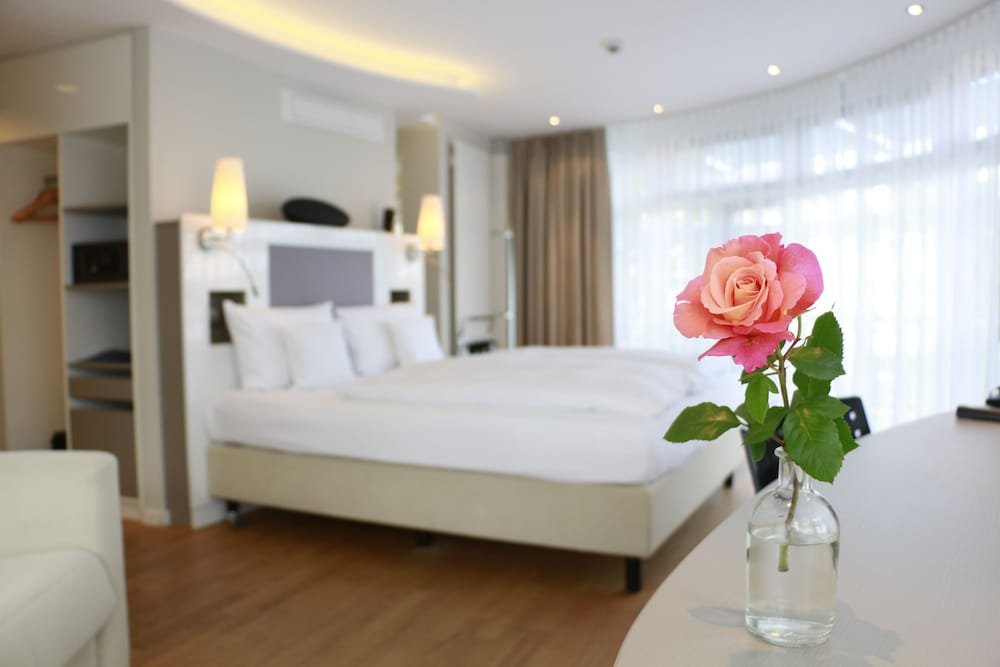 Фото Kongresshotel Potsdam am Templiner See