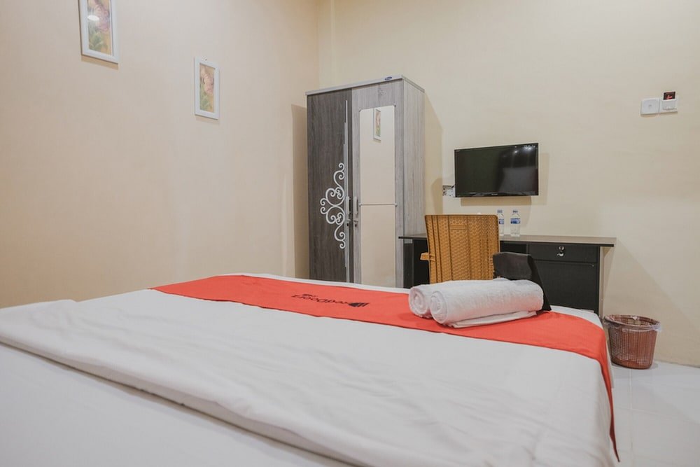 Фото Urbanview Hotel Ta Ke Jelutung Jambi
