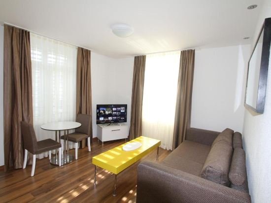 Фото Luxury Apartments by Livingdowntown