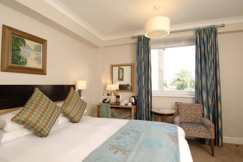 Фото The Maids Head Hotel