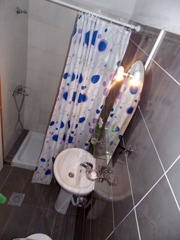 Фото Nikos Apartments