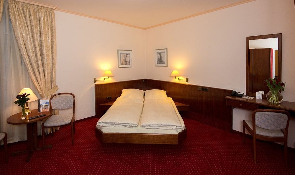 Фото Hotel am Kochbrunnen