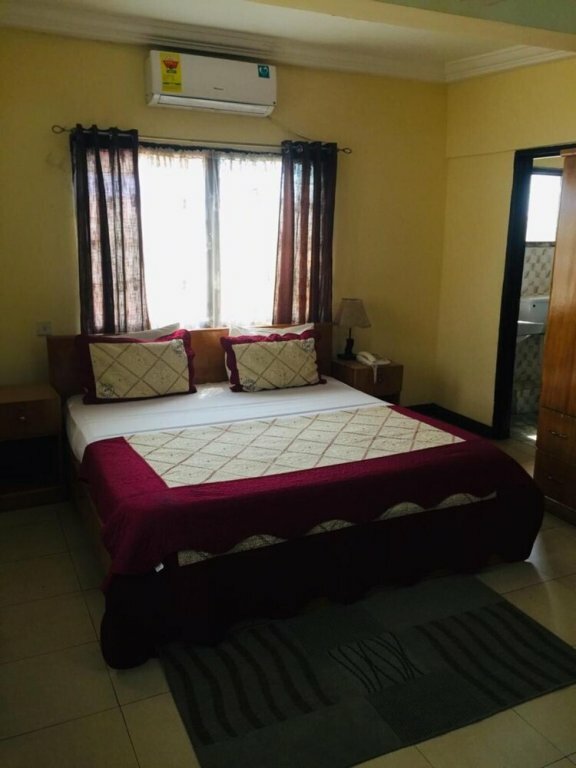 Гостиница Double Room With Sitting Area в Аккре