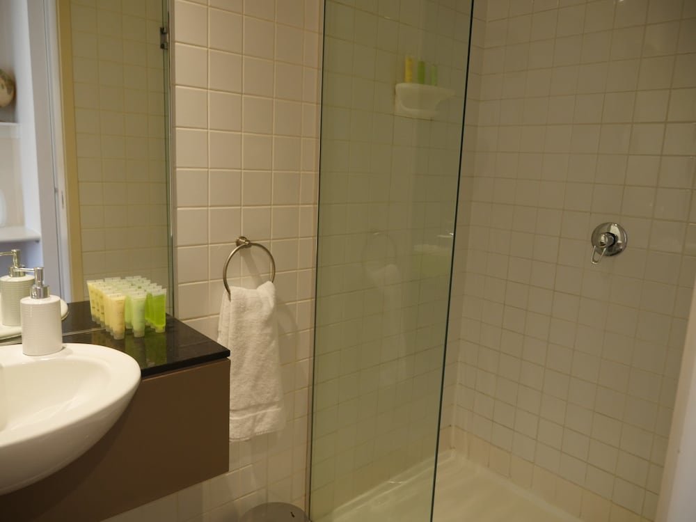 Фото Plum Collins Street Serviced Apartments