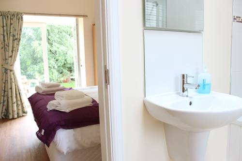 Фото Auchendennan Luxury Self Catering Cottages