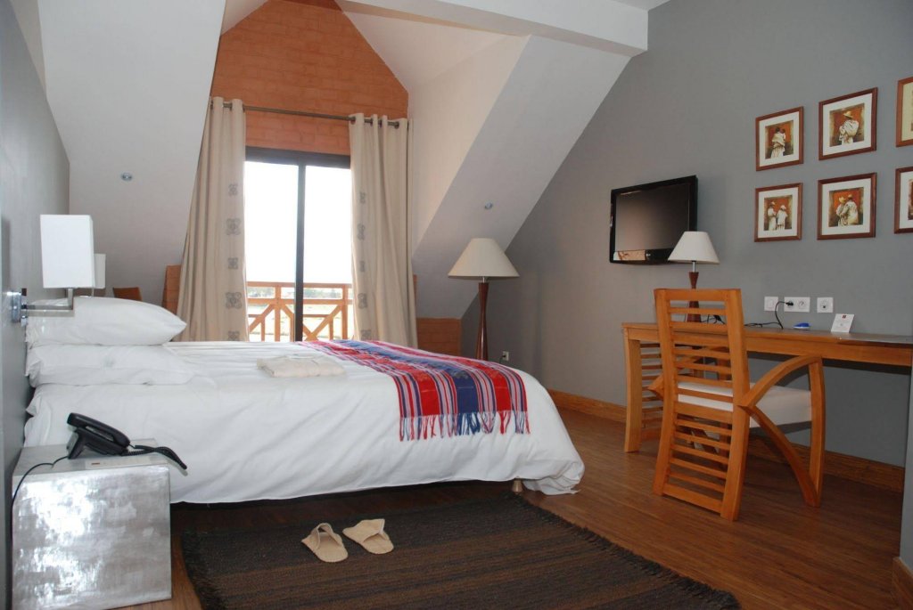 Фото Tamboho Hotel