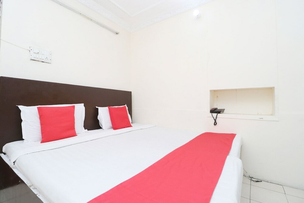 Фото Oyo 30274 Temple City Guest House