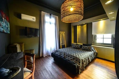 Фото Ambit Boulevard Hotel Boutique