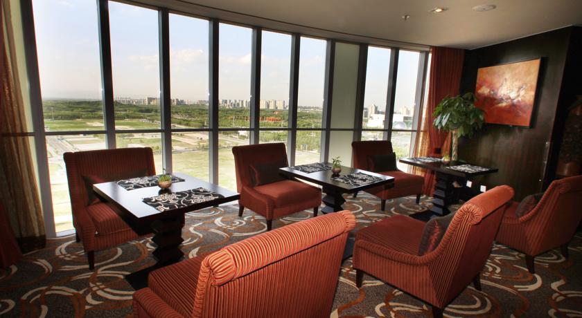 Фото China National Convention Center Grand Hotel