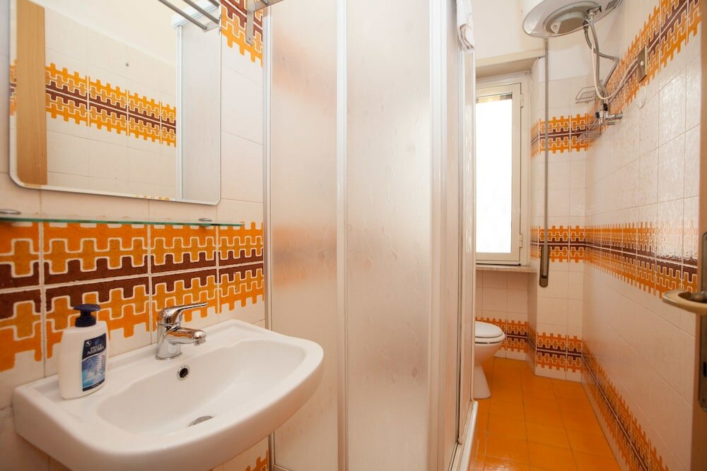 Фото Rental In Rome Devoti Apartment