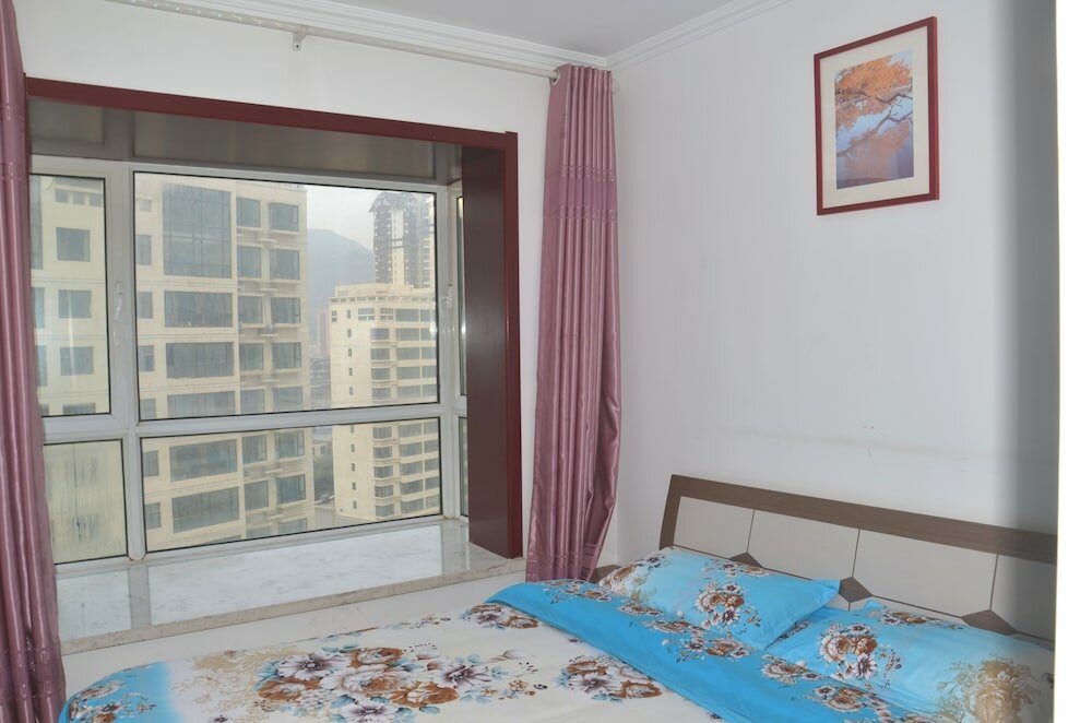 Фото Lanzhou Longshang Mingzhu Apartment Two-bedroom suite