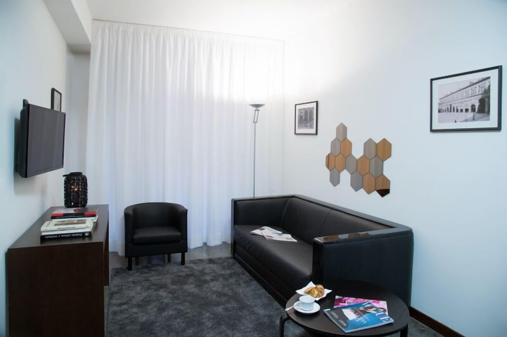 Фото Phi Hotel Bologna