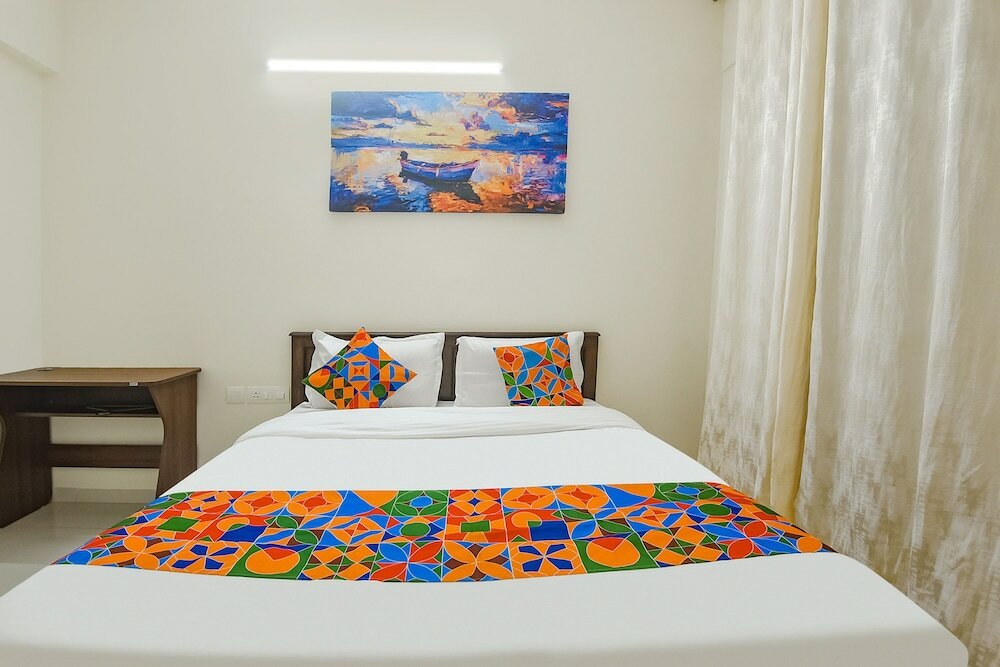 Фото Fabhotel Prime Santoshi Holiday Homes