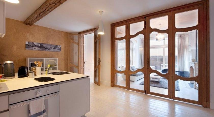 Фото Le Coup de Coeur Apartment Sablon