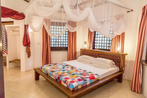Гостиница Tequila Sunrise Beach Villa в Кении