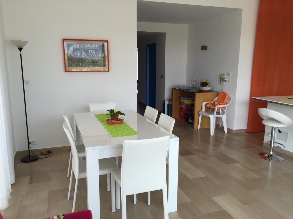 Фото La terrazza sul porto