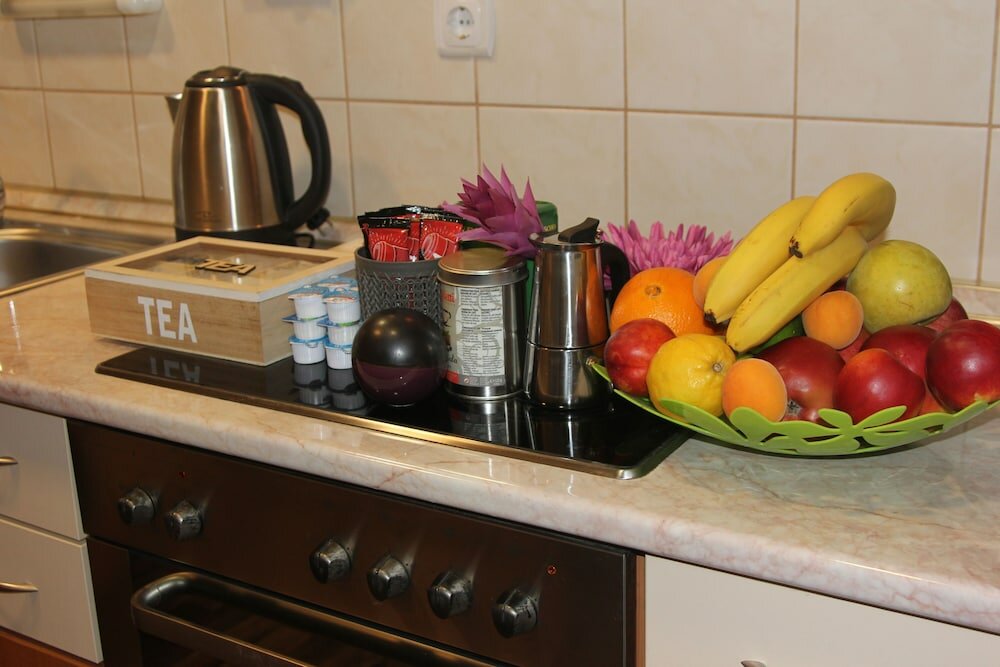 Фото Gold Downtown Apartman