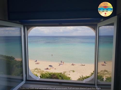 Фото Hotel Caraibisiaco sul Mare