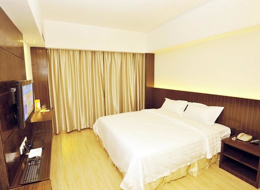 Фото Tengda Businss Hotel - Zhuhai