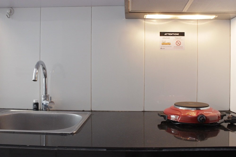 Фото Gorgeous 2BR Apartment at Gateway Pasteur