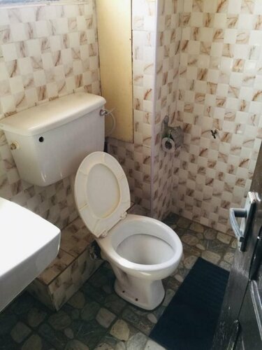 Гостиница Double Room With Sitting Area в Аккре
