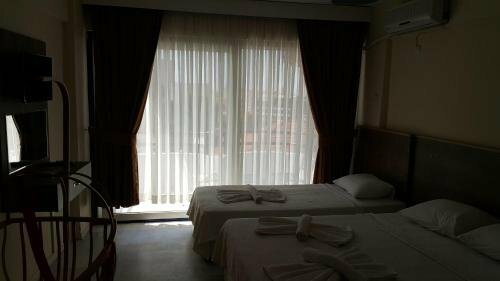 Гостиница Ozgun Apart Otel в Кушадасы