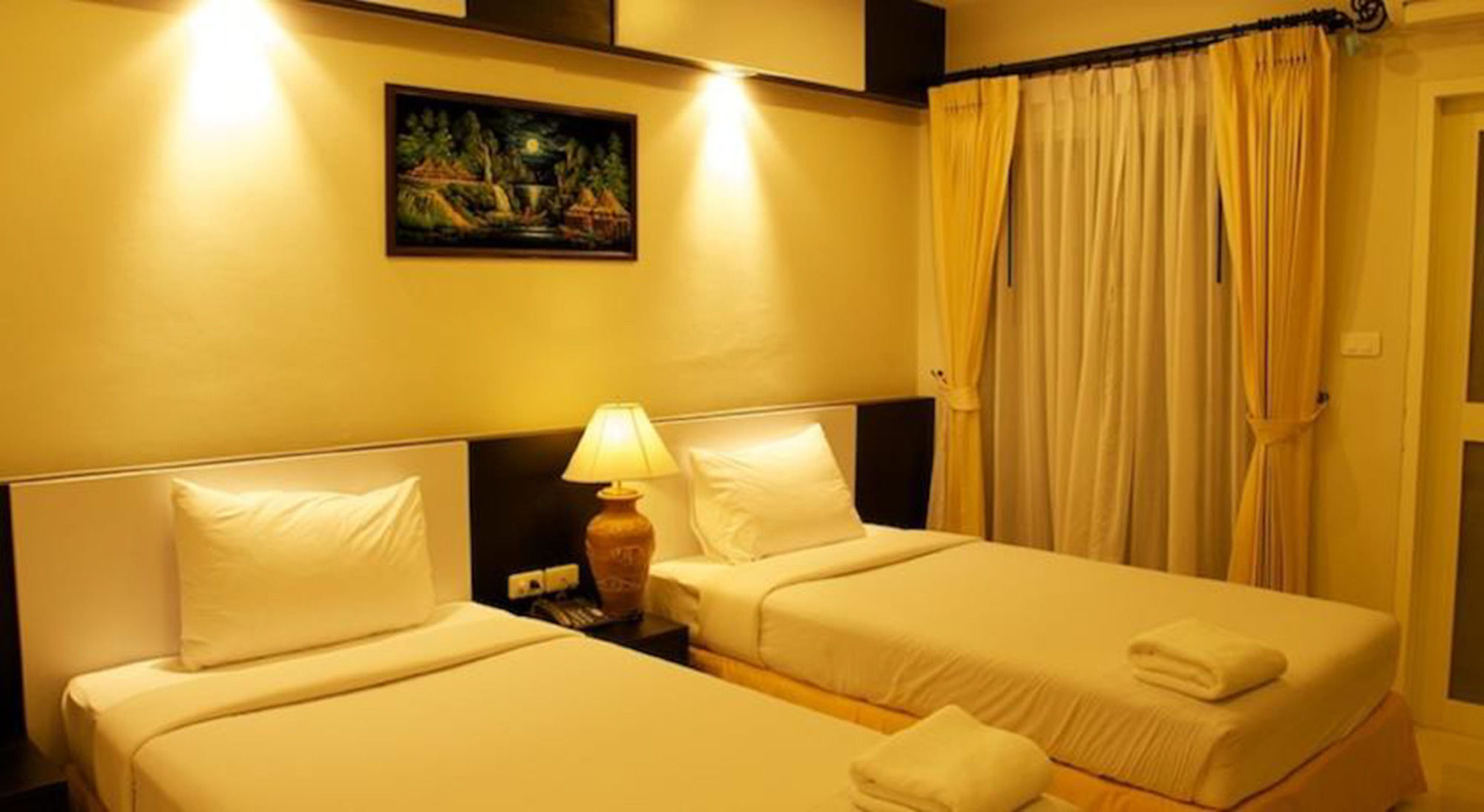 Фото Airport Mansion Phuket