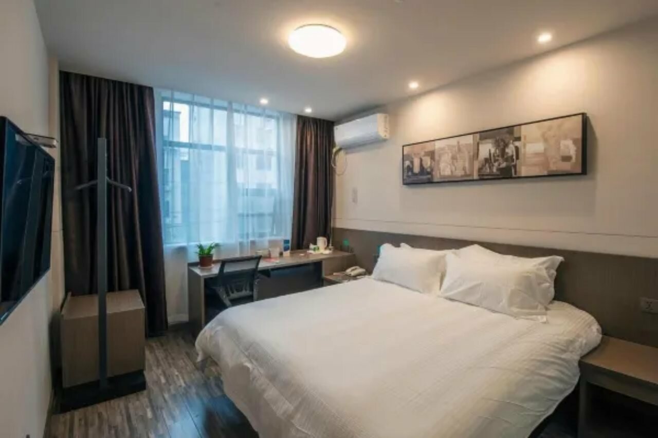 Фото Jinjiang Inn Style Xinyu Railway Station