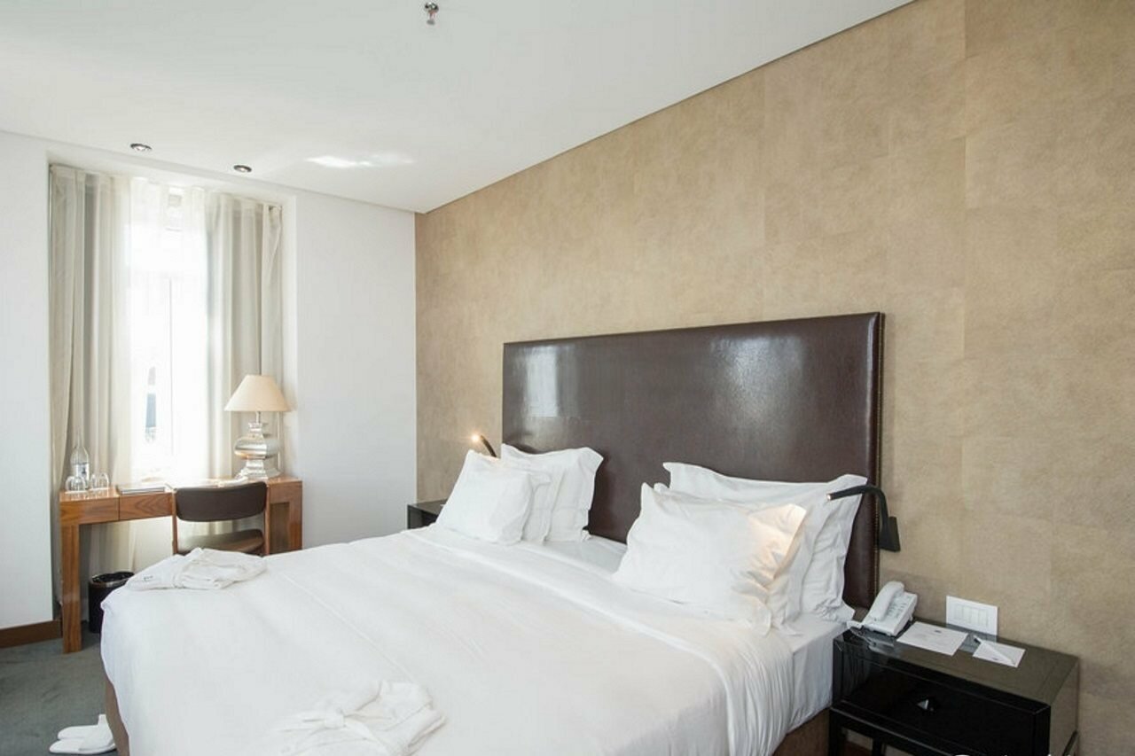 Фото Lisboa Carmo Hotel
