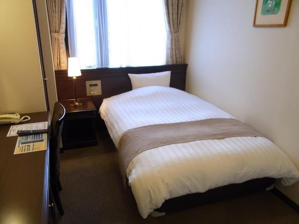 Фото Amami Sunplaza Hotel