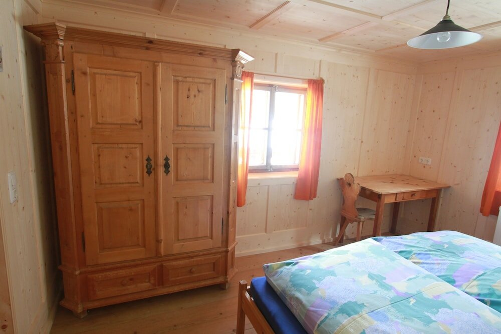 Фото Ferienwohnungen am Berg - Almhütte Alfen