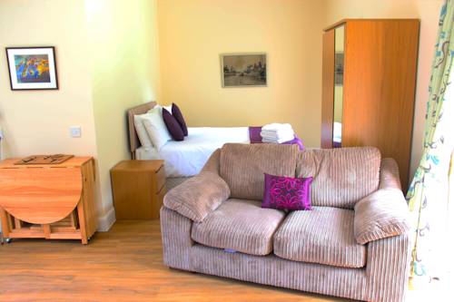 Фото Auchendennan Luxury Self Catering Cottages