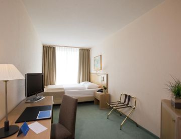 Фото Nh Fribourg Hotel