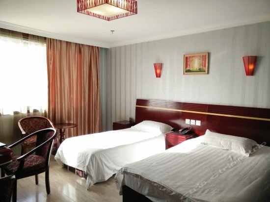 Фото Shanghai Ruijing Business Hotel