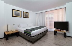 Гостиница Madisson Inn Hotel & Luxury Suites by Geh Suites