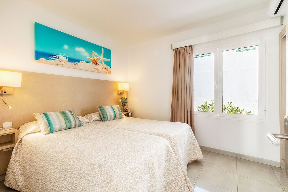 Фото Apartamentos Livvo Oasis