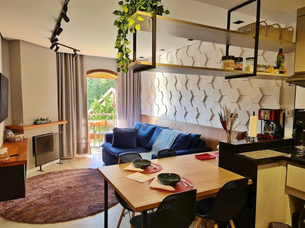 Фото Dúplex Luxo com Piscina Aquecida, Lareira e Wifi