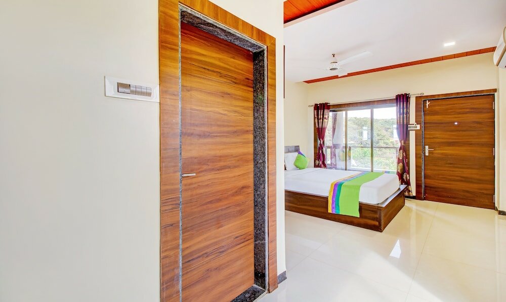 Фото Treebo Trend Garden Cottage & Lawn