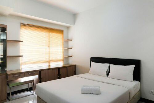 Гостиница Simply Furnished Studio Apartment at Scientia Residence в Тангеранге