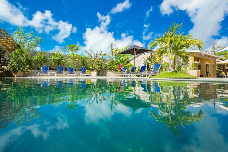 Гостиница Kokomo Botanical Resort - Caribbean Family Cottages